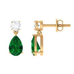 Product Details If youre looking for a stunning accessory for your special occasions and events, consider the sparkling and elegant Drop Earrings. These earrings feature a Round Cut Moissanite at the top, with a stunning Pear Cut Created Emerald dangling below, all set in gold. The earrings are designed with screw-backs for a comfortable and secure fit. These Gemstone Earrings would make an excellent anniversary gift for your partner, surprising her with their beauty and elegance. Product Inform Lab Created Emerald, Pear Cut, Teardrop Earrings, Gemstone Earrings, Prong Setting, Anniversary Gift, Round Cut, Anniversary Gifts, Pear