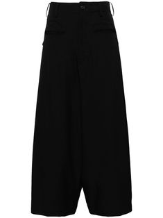 black wool high-waisted belt loops concealed fly and button fastening two side inset pockets two rear flap pockets wide leg