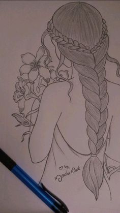 a drawing of a girl with braids and flowers in her hair, next to a pen