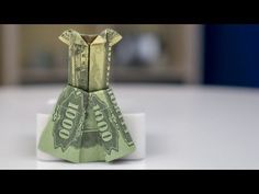 origami money folded into an origami vase