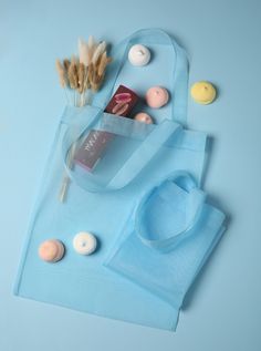 a blue bag with some candy on it