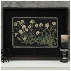 Dimensions: 19" H x 25" W x 1.37" D Material: Glass, MDF & Canvas Shape: Rectangle Color: Black, Green, White & Brown Orientation: Horizontal Includes: 2 D-Rings Care & Safety: Do Not Hang With Wire Quantity: 1 Give your home some sophisticated style with the help of this Wildflowers Framed Wall Decor. This darling piece depicts white wildflowers supported by long stems sprouting from a small patch of dirt. The lovely design is printed on a patch of black fabric with frayed edges for a handmade look. It rests against a black mat and is protected by a glass panel. Hang this piece up in your living room or bedroom for a one-of-a-kind look! White Wildflowers, Spring Wall Decor, Wall Decor Hobby Lobby, Spring Wall Art, Glass Panel, Frame Wall Decor, Hobby Lobby, Natural History, Glass Panels