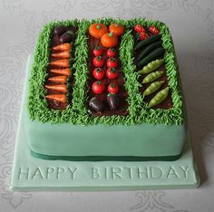 a cake that is shaped like a vegetable garden