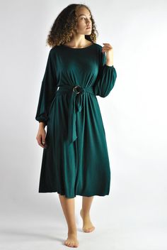 Chic Green Belted Maxi Dress, Green Belted Midi Length Dresses, Green Belted Midi Dress, Elegant Green Long Sleeve Dress For Fall, Elegant Long Sleeve Dark Green Dress, Green Long Sleeve Dress For Fall, Green Long Sleeve Midi Dress For Work, Green Long Sleeve Maxi Dress For Work, Fall Midi Dress With Belted Cuffs