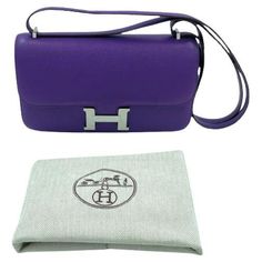 Stunning Hermès Constance Elan bag in purple crocus Epsom leather. Comes in its original HERMES dustbag ! Condition : very good Made in France Collection : Constance Elan Gender : woman Material: Epsom leather Color : crocus Measurements : 25 x 15 x 5.5 cm Shoulder strap : short : 67 cm, long : 118 cm Letter : P in a square Year : 2012 Hardware : silver finish metal Details: can be worn on the shoulder or cross-body. Purple Crocus, Timeless Bags, Modernist Jewelry, Hermes Constance, Kelly Bag, Vintage Hermes, Letter P, Hermes Bags, Vintage Chanel