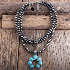 Triple Strand Gray Beaded Necklace Is Adjustable From 16” To 18” Long Turquoise Squash Blossom Pendant Is 2” Long Boho, Western, Southwestern, Cowgirl, Texas, Bull, Horn, Gold, Stone, Jasper, Jewelry, Necklace, Beaded, Precious, Semi Precious Stone, Turquoise, Steer, Ox Crescent Moon Artisan Handmade Silver Layered Triple Choker Coast Cowgirl, Gray Beaded Necklace, Turquoise Squash Blossom, Multi Layer Necklace, Squash Blossom Necklace, Squash Blossom, Feather Necklaces, Western Jewelry, Lariat Necklace