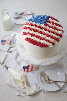 an american flag cake with red, white and blue icing