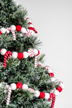 a christmas tree decorated with candy canes and ornaments