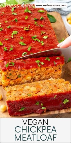 vegan chickpea meatloaf sliced on a cutting board