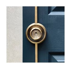 a door handle on a blue and white door