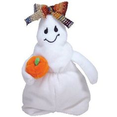 a white stuffed ghost with a pumpkin in its hand