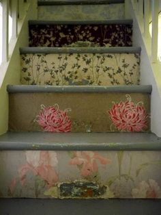 the stairs are painted with flowers on them