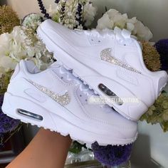 Your Custom Unique White Sparkly Crystal Nike Air Max 90 shoes are fully custom hand crystallised and guaranteed to bring some sparkly BLING to your life! These Nike Air Max 90 Trainers are 100% unique with no two pairs the same. Super comfortable shoes! 𝕀𝕄ℙℝ𝔼𝕊𝕊 𝔼𝕍𝔼ℝ𝕐𝕆ℕ𝔼 with these custom Crystalized Air Max Kicks today! Size: Please contact us if unsure on what size you need.  UK 2 / EU 34 / Girls 2.5Y UK 2.5 / EU 35 / Girls 3Y UK 3 / EU 35.5 / Girls 3.5Y UK 3.5 / EU 36 / Girls 4Y / Bride Sneakers, Bling Nike, Nike Trainer, Swarovski Nike, Nike Air Max 90s, All White Sneakers, Air Max 90 Women, Air Max 90s, Air Max 90 Premium