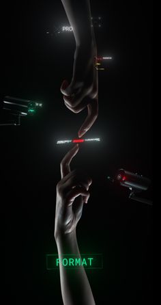 two hands reaching towards each other with the words format in green and red lights above them