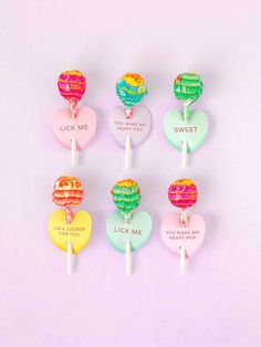 candy lollipops with the words i love you written on them in different colors