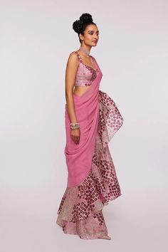 Pink Divergence printed and embellished organza ruffle saree and blouse.From Aisha Rao's Divergence collection. DELIVERY TIMEPlease allow 6-8 weeks for your outfit to arrive. FABRIC DETAILSIndian Organza. Organza Ruffle Saree, Aisha Rao, Saree And Blouse, Ruffle Saree, Embellished Blouse, Indian Attire, Fancy Sarees, Pink Saree, Bridal Designs