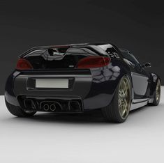 the rear end of a black sports car