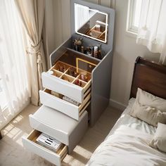 the drawers are open on top of each other