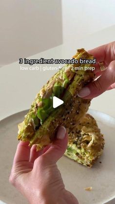 a person is holding up a sandwich on a plate with the words, 3 ingredients avocado bread