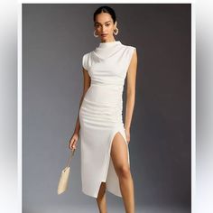 Elevate Your Wardrobe With This Stunning Anthropologie Maya Dress. The Ivory Polyester Blend Knit Fabric Drapes Flawlessly In A Midi Pencil Dress Style, Featuring A Sultry Cowl Neck And Ruched Details For An Added Touch Of Sophistication. The Sleeveless Design With A Pullover Closure Makes It Versatile For Any Occasion, Including Party, Cocktail, Formal, Or Casual. 1920s Women, Tropical Print Maxi Dress, Mock Neck Mini Dress, Tie Dye Mini Dress, Cocktail Formal, Midi Pencil Dress, White Cocktail Dress, Cowl Neck Dress, Strapless Midi Dress