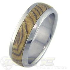 a wedding ring with wood inlays on the outside and inside, made from stainless steel