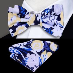 Blooms of Elegance: Blue, White, and Yellow Abstract Floral Silk Bow Tie Immerse yourself in a garden of style with our blue, white, and yellow abstract floral silk bow tie – a refined accessory that effortlessly marries classic charm with a touch of contemporary flair. This bow tie isn't merely an addition to your wardrobe; it's a statement piece that allows you to showcase your unique style with confidence. Join us as we embark on a journey through the enchanting details of this floral bow tie Brown Bow Tie, Yellow Bow Tie, Purple Bow Tie, Light Blue Dress Shirt, Classic White Dress, White Bow Tie, Plaid Bow Tie, Floral Bow Tie, Pink Bow Tie