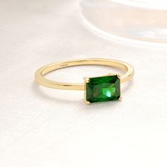 Here's Emerald Emerald Engagement Ring for bride! This Birthstone Solitaire Wedding Ring can be best Birthday Gift as a Custom Gemstone Ring! This Solitaire Gemstone Ring is will be exciting Gifted for Daughter, Future Mrs, Fiancé or Women.  10K 14K 18K Gold Birthmonth Promising Jewelry will be perfect and brilliant Shower Ring in her wedding or engagement ceremony. Green Gemstone Ring can be switched with her birthstone and you can create your own emerald cut ring 10K. If you re looking emerald emerald her, here's the stunning Solitaire Ring bride, girl friend, wife or for yourself. Please check our other engagement rings: https://www.etsy.com/your/shops/me/tools/listings/section:43243795,stats:true Jewelry Details Band:14K Carat:585 Gemstone: AAA cubic Zirconia Our products are AAA+ qual Classic Cubic Zirconia Birthstone Ring For May, May Birthstone Wedding Ring In Cubic Zirconia, 14k Gold Solitaire Wedding Ring For May Birthstone, Classic Cubic Zirconia May Birthstone Ring, Yellow Gold Emerald Cut Cubic Zirconia Birthstone Ring, May Birthstone Ring For Wedding In 14k Gold, May Birthstone Solitaire Ring For Wedding, 14k Gold Birthstone Ring For May Wedding, Emerald Cut Solitaire Birthstone Wedding Ring