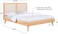 a bed with measurements for the headboard and foot board on each side, along with two pillows