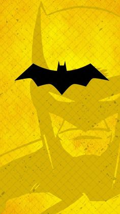 the batman movie poster is shown in yellow and black with an image of his face