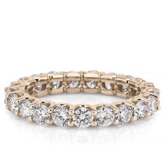 Our Stella eternity band features a complete circle of sparkling round brilliant lab diamonds, secured in a scalloped, U-prong setting. Wear this airy, scalloped eternity band on its own, pair it with an engagement ring, or add it to your ring stack to celebrate an anniversary. This scalloped eternity band is also available in a 2mm width.  Eternity bands are not resizable. Please ensure you are confident in the ring size you select. Fine Jewelry Rose Gold Eternity Band With Prong Setting, Diamond White Diamond Eternity Band With Halo, Diamond White Eternity Band With Halo, Diamond White Halo Eternity Band, Luxury Round Eternity Band With Prong Setting, Rose Gold Diamond Eternity Band With Prong Setting, Timeless Rose Gold Eternity Band With Prong Setting, Diamond White Halo Eternity Band Fine Jewelry, Dazzling Lab-grown Diamond Eternity Band