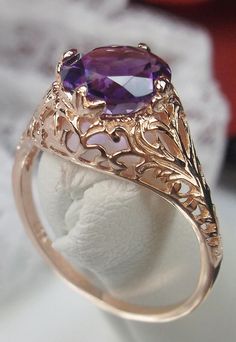 Natural Purple Amethyst Ring Coffee Design#198 This is a stunning Art Nouveau/Victorian reproduction in sterling silver and rose gold plated filigree with a 1.2ct natural purple amethyst gemstone. The stunning amethyst gemstone is 8mm in diameter. The inside of the band is marked 925 for sterling. Notice the beautiful craftsmanship of the silver & gold filigree setting and band. This is a ornate and detailed ring. This is a lovely rendition of an antique filigree ring; and it is ready to wear. A Amethyst Ring Rose Gold, Leaf Filigree, Amethyst Wedding, Gold Amethyst Ring, Purple Amethyst Ring, Amethyst Gem, Victorian Rings, Filigree Ring, Victorian Jewelry