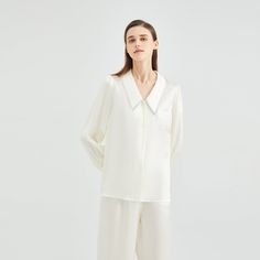 This luxurious women's v-neck silk pajama set made with 100% mulberry silk. Mulberry silk is the most luxurious type of silk and is sought after worldwide. Mulberry silk is known for its delicate and smooth texture and rich color. Mulberry silk fabric is also very durable, making it perfect for sleepwear, especially pajamas. The fabric is soft to the touch while being breathable, making it perfect for when relaxing at home or sleeping. 100% 19 Momme Mulberry Silk (High Grade 6A) Thread Count:400 Silk Pajamas Set, Silk Comforter, Silk Pajamas Women, Mulberry Silk Fabric, Silk Pajama, Silk Pajama Set, Silk Trousers, Silk Pajamas, Silk Material