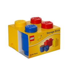 a yellow lego storage brick box with two red and one blue bricks in it on a white background