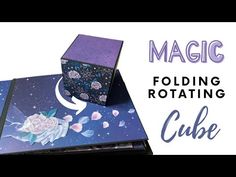 an open box with flowers on it and the words magic folding rotating cube in blue