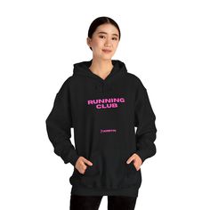 Design: Unisex "Kinectic Running" Pullover Sports Hoodie * Please consult size guide to ensure you get an accurate fit * Unisex relaxed fit with a slightly tapered hem for a flattering silhouette (runs true to size) * 60% Polyester, 40% US Cotton * Adjustable hood drawstring for a customized fit * Spacious kangaroo pocket for warmth and convenience * Care: Machine washable (Cold) for easy maintenance Description: Unwind in style with the RelaxFit Sports Hoodie, your perfect companion for post-workout recovery or casual outings. Designed with comfort in mind, this hoodie features ultra-soft fabric that feels gentle against your skin while offering a relaxed fit for easy movement. The lightweight, breathable material keeps you cool and comfortable, whether you're stretching after a workout o Running Gift, Workout Recovery, Running Gifts, Running Club, Post Workout Recovery, Marathon Runners, Sports Hoodies, Sports Clothing, Post Workout