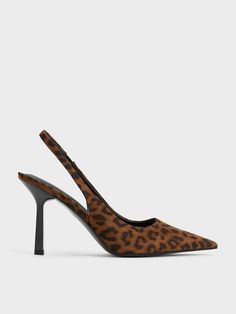 Combining a timeless silhouette with modern details, these slingback pumps are both classic and cool. They feature square vamps, sculptural heels and an eye-catching leopard print finish that will introduce a touch of fierce elegance into any look. The elasticised slingback straps make them easy to slip on and off, ensuring effortless style even on busy mornings. Keep the rest of your outfit simple to let this statement pair truly shine. Sculptural Heels, Sling Back Heels, Outfit Simple, Charles Keith, Brown Leopard, Sling Back, Slingback Pump, Trending Shoes, Your Outfit