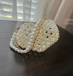 Purse Amore. Unique 3d heart shaped imitation pearl beaded purse, color ivory, size 4.5" x 6.5" x 3.5" Pearl Bags Purses, Handmade Pearl Evening Bag In Cream, Pearl White Pearl Clutch As Gift, Cream Beaded Clutch As Gift, White Clutch With Pearl Handle As Gift, White Pearl Clutch Gift, Handmade Cream Pearl Evening Bag, Pearl Purse Making, Heart-shaped Beaded Bag As Gift