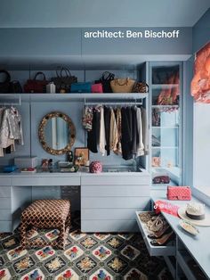 an organized closet is shown with clothes and handbags on the shelves, along with other accessories