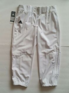 the adidas pants are white and have black stripes on them, but no one is wearing