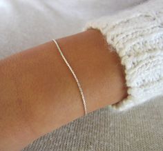 "Beautiful delicate minimalist sterling silver bracelet. Wear this alone, or layer it with your other favorites for a personalized eclectic look. ❉ F A C T S Standard bracelet size for women is around 6.5\" inches (16.5 cm). Men size is around 7.5\" inches (19 cm) although every wrist varies in size. Choose from these lengths in the drop down menu before checkout: Bracelet size: 5.5-6 inch. 14-15 cm 6-6.5 inch. 15-16.5 cm 6.5-7 inch. 16.5-17.5 cm 7-7.5 inch. 17.5-19 cm 7.5-8 inch. 19-20.5 cm All Minimalist Necklace Silver, Bracelet Minimal, Silver Necklace Simple, Minimal Bracelet, Silver Bracelets For Women, Sterling Bracelets, Bracelet Dainty, Silver Chain Style, Dainty Chain