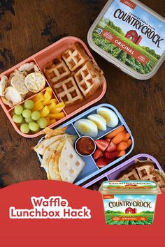 the lunch box is full of different types of food, including waffles and fruit