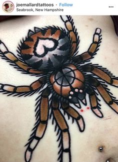 a woman's stomach with a tattoo design on the side of her body and an image of a spider