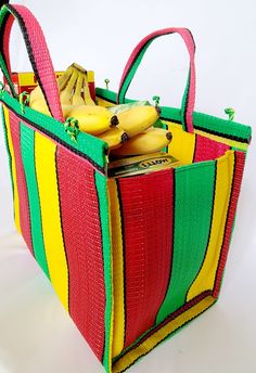 Material: Recycled plastic. Color: Brown, yellow, green, black. Size : Height 14.5" Width 16.5" Use: Grocery, beach, pool... Property: Waterproof, easy to clean. Origin: West Africa. Handwoven bags made from recycled plastics. This bag is waterproof and very easy to clean. This material is very strong and can hold heavy contain. Multicolor Plastic Beach Bags, Reusable Multicolor Rectangular Beach Bag, Eco-friendly Yellow Beach Bag For Daily Use, Eco-friendly Yellow Beach Bag, Recyclable Green Vacation Bag, Eco-friendly Yellow Recyclable Bag, Multicolor Recyclable Beach Bag For Vacation, Multicolor Reusable Beach Bag, Eco-friendly Upcycled Beach Bags