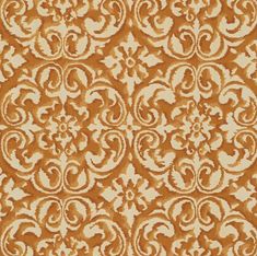 an orange and white pattern on fabric