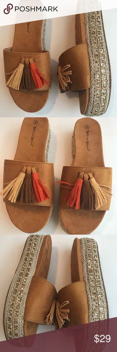 NATURE BREEZE CAPRICE PLATFORM SANDALS CAMEL Nature Breeze Caprice Camel wedge sandals espadrilles faux suede upper 2 inches wedge lined with golden cord and tiny sequins tassels orange brown and tan true to size. These are cute and will give 2 inches in height. Great for vacation. Any questions please ask. New in box. Cute for the pool and beach. Take a pair on your vacation. Nature Breeze Shoes Sandals Pool And Beach, Orange Brown, Sandal Espadrille, Platform Sandals, Wedge Sandals, Women's Shoes Sandals, Faux Suede, Camel, Shoes Sandals