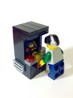 there is a lego man making something out of a toy oven