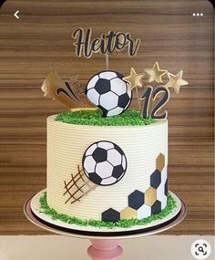 a soccer themed birthday cake on a table