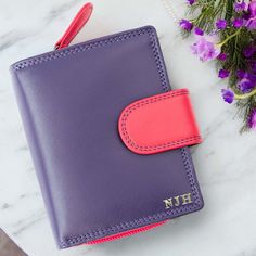 This Wallet for Women features a Credit Card Holder with RFID protection, making it a secure and stylish choice as a Small Wallet and Personalised Purse. The Trifold Coin Pouch in this Ladies Purple Leather Wallet makes it a thoughtful gift idea for women. DETAILS ❤️ Style: Trifold Purse 👜 Material: Leather 🔒 RFID Protection 🔗 Secure Tab Fastener 💳 9 Card Slots 🆔 ID Window 💵 Note Compartment 💰 Zipped Coin Pocket 🎁 Gift Boxed 📏 DIMENSIONS: 3.7" / 9.5cm x 4.5" / 11.5cm x 1.5" / 4cm ⚖️ Wei