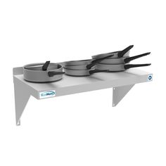 a set of pots and pans sitting on top of a metal shelf with four black handles