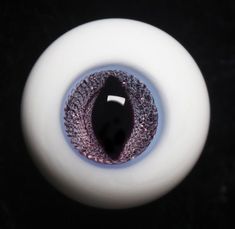 an eyeball is shown in the dark